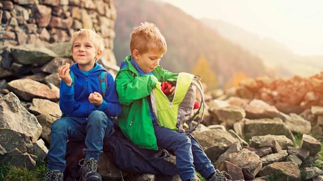 Two boys having a picnic